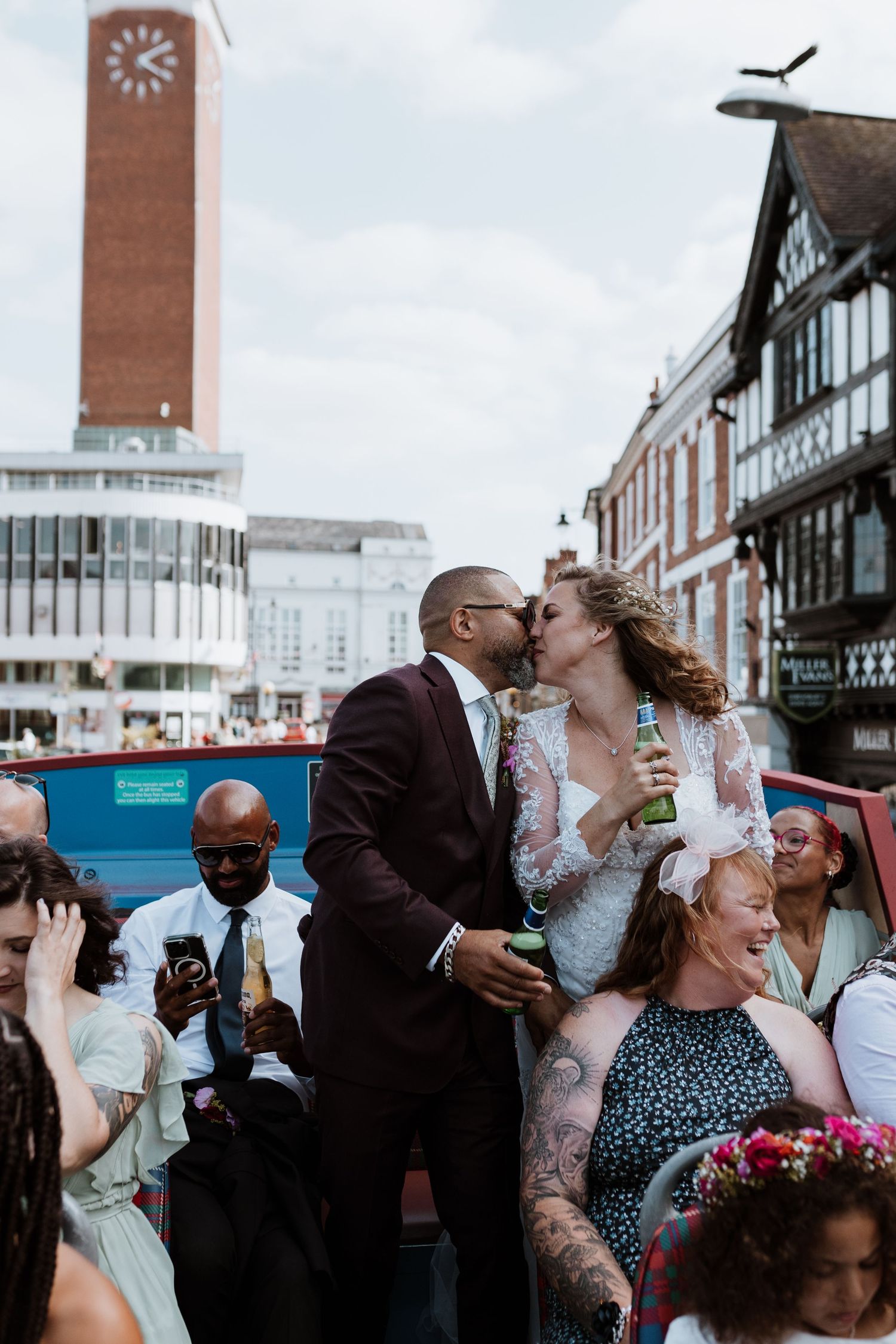 A joyful wedding celebration takes place on a topless bus driving through Shrewsbury