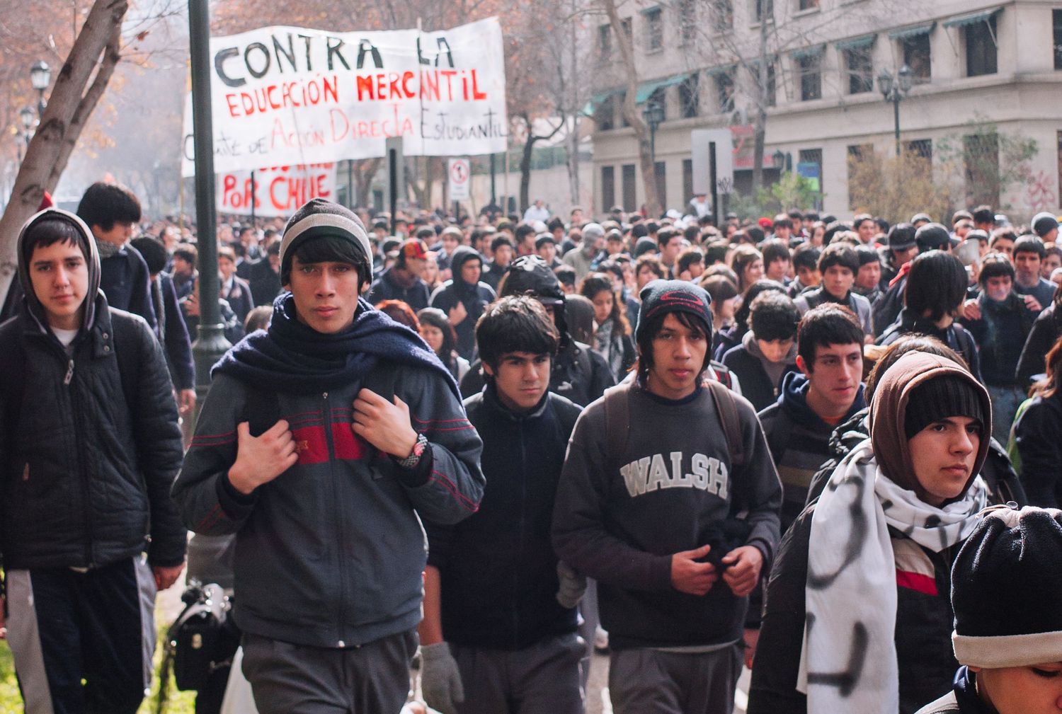 Large crowd of students protesting during a street demonstration for a fairer education system. Santiago, Chile