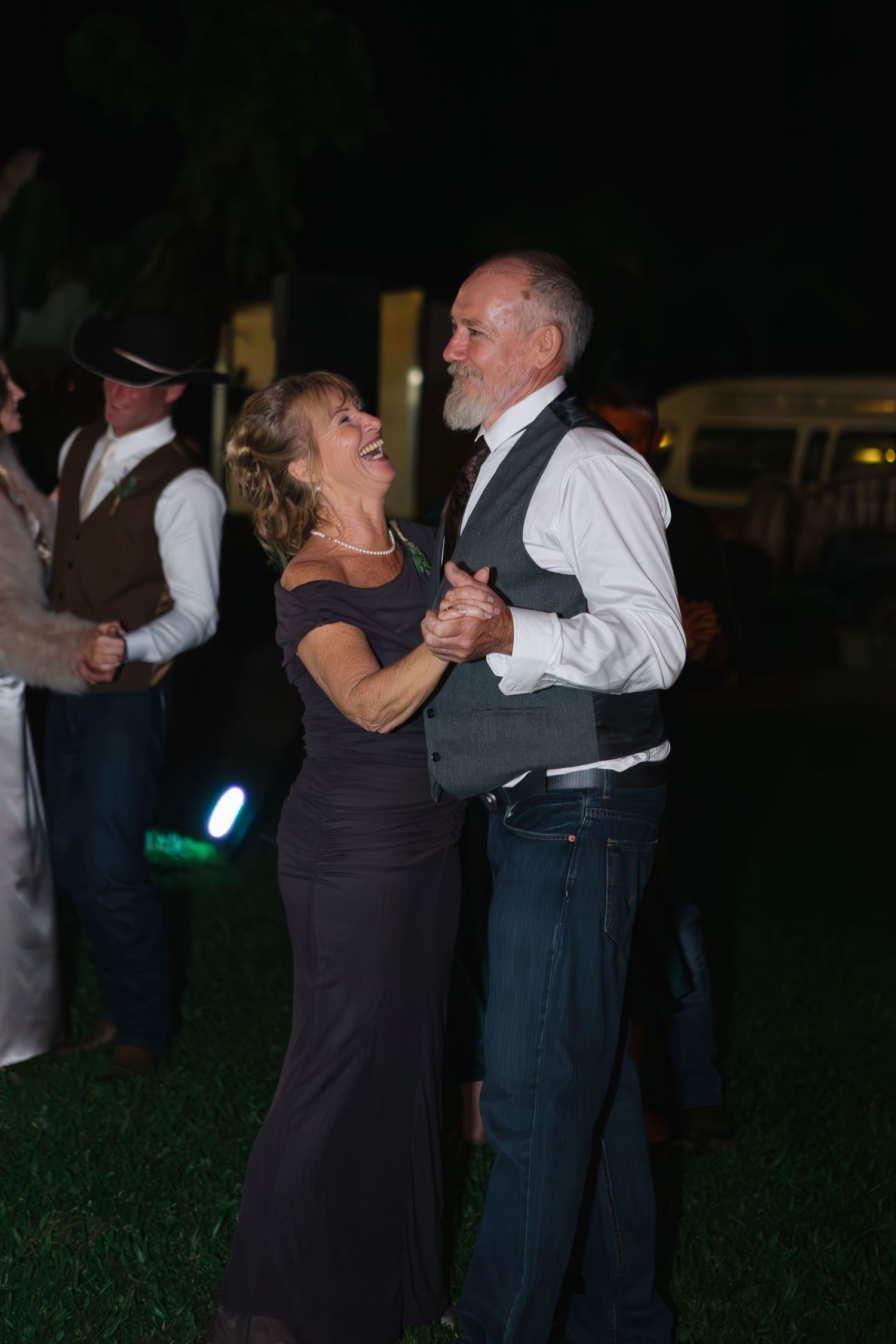 Mother and father of the bride dancing at country Port Douglas Wedding