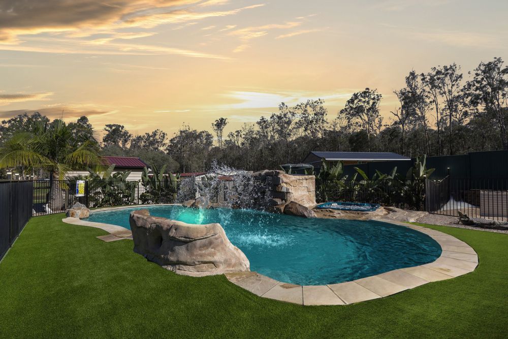 Luxury backyard pool photographed at sunset by Gold Coast and Brisbane real estate photographer