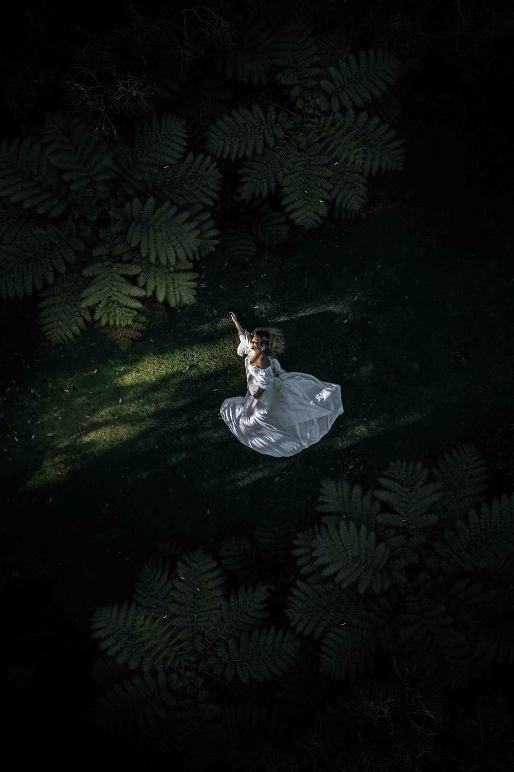 Aerial-Maternity-Cave-Beach-Jervis Bay-Pregnant-women-laying-in-the-rich-greenery-of-the-Jervis-Bay National Park.