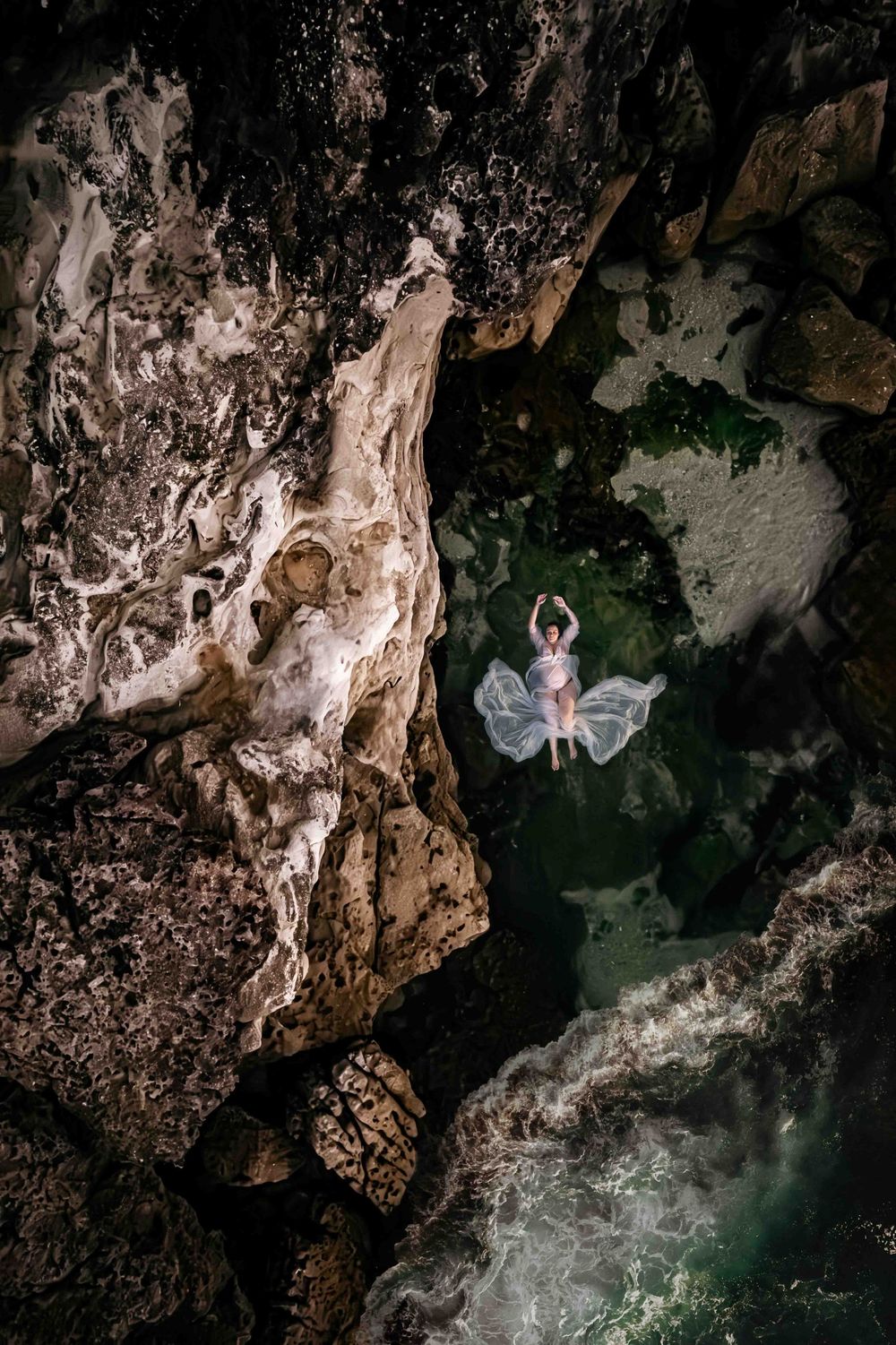 Aerial Photography Jervis Bay -Pregnant women floating in secret rock pool.