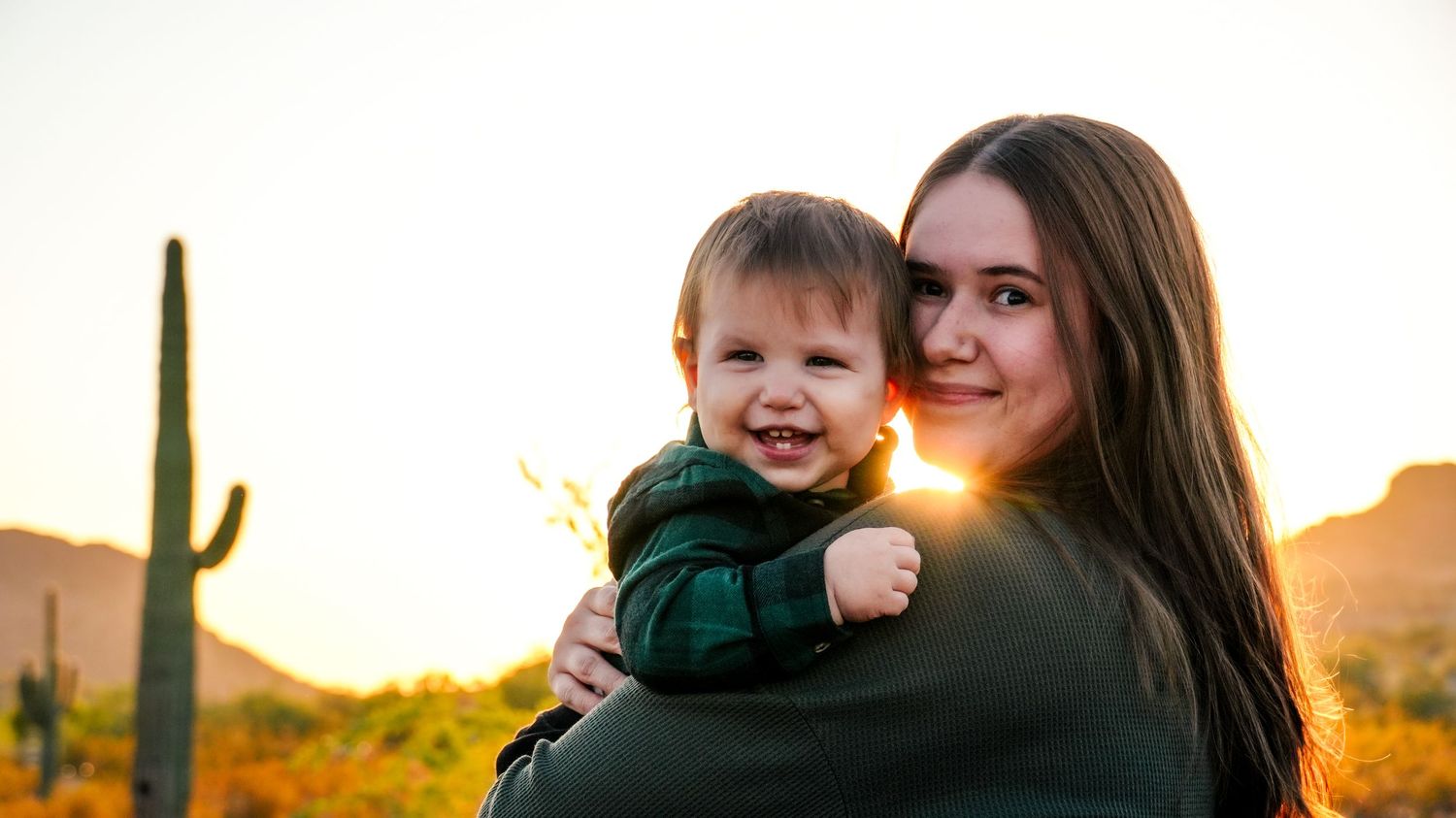 A black and white photograph featuring a Mommy & Me photography session with Samantha Stickroth Photography. An affordable photographer, AZ.