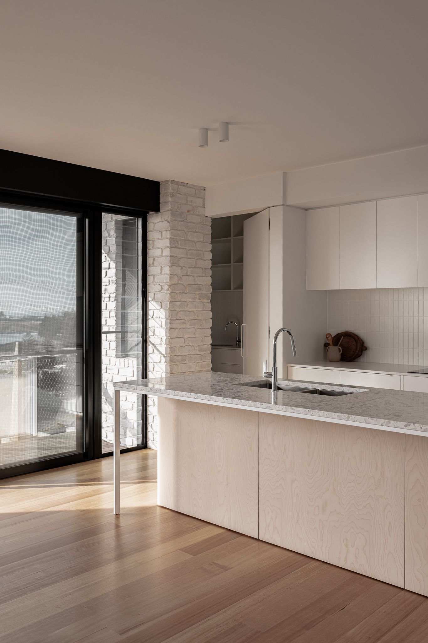 Modern kitchen with timber joinery — interior photography South Coast for designers and builders.