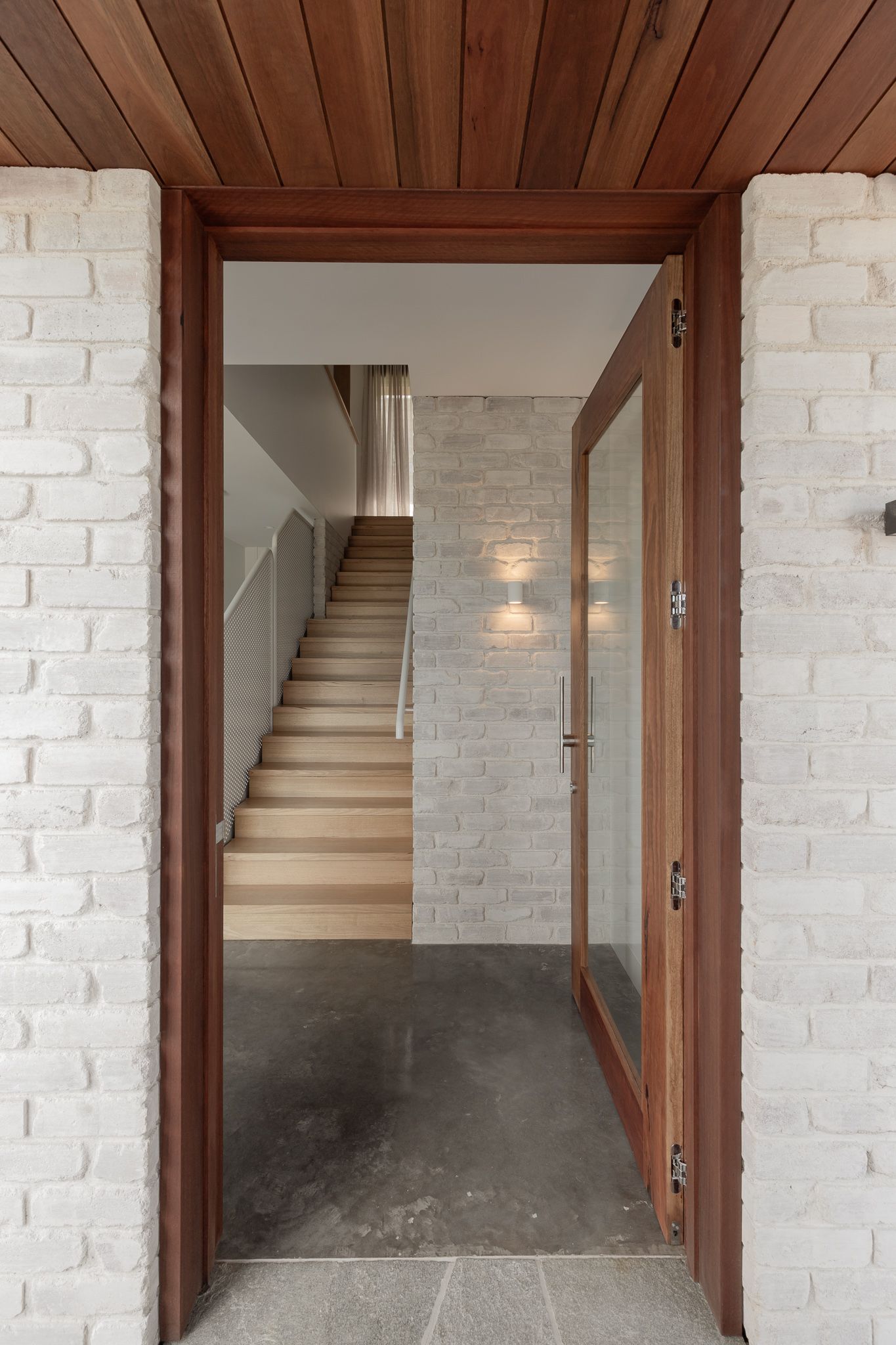 Timber and textured brick front entry. Architecturally designed