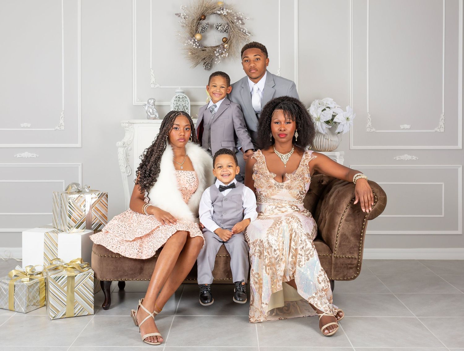 Magical Christmas studio portrait with holiday decor — captured in Bradenton-Sarasota Lakewood Ranch by local portrait photographer
