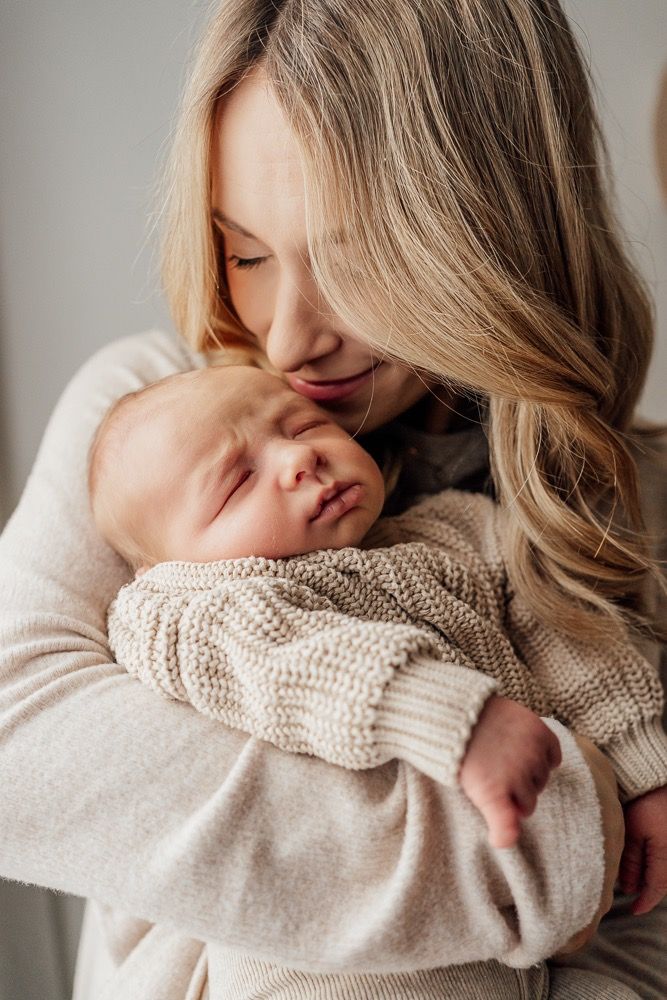 Artistic portrait series showing close-up details of blonde hair and cozy cream knit sweater against neutral background.
