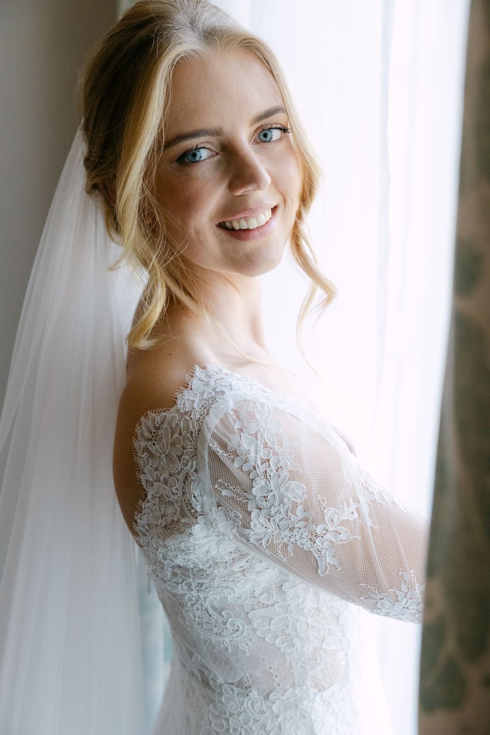 Dreamy portrait sequence of a bride in a delicate white lace wedding gown against a soft light background.
