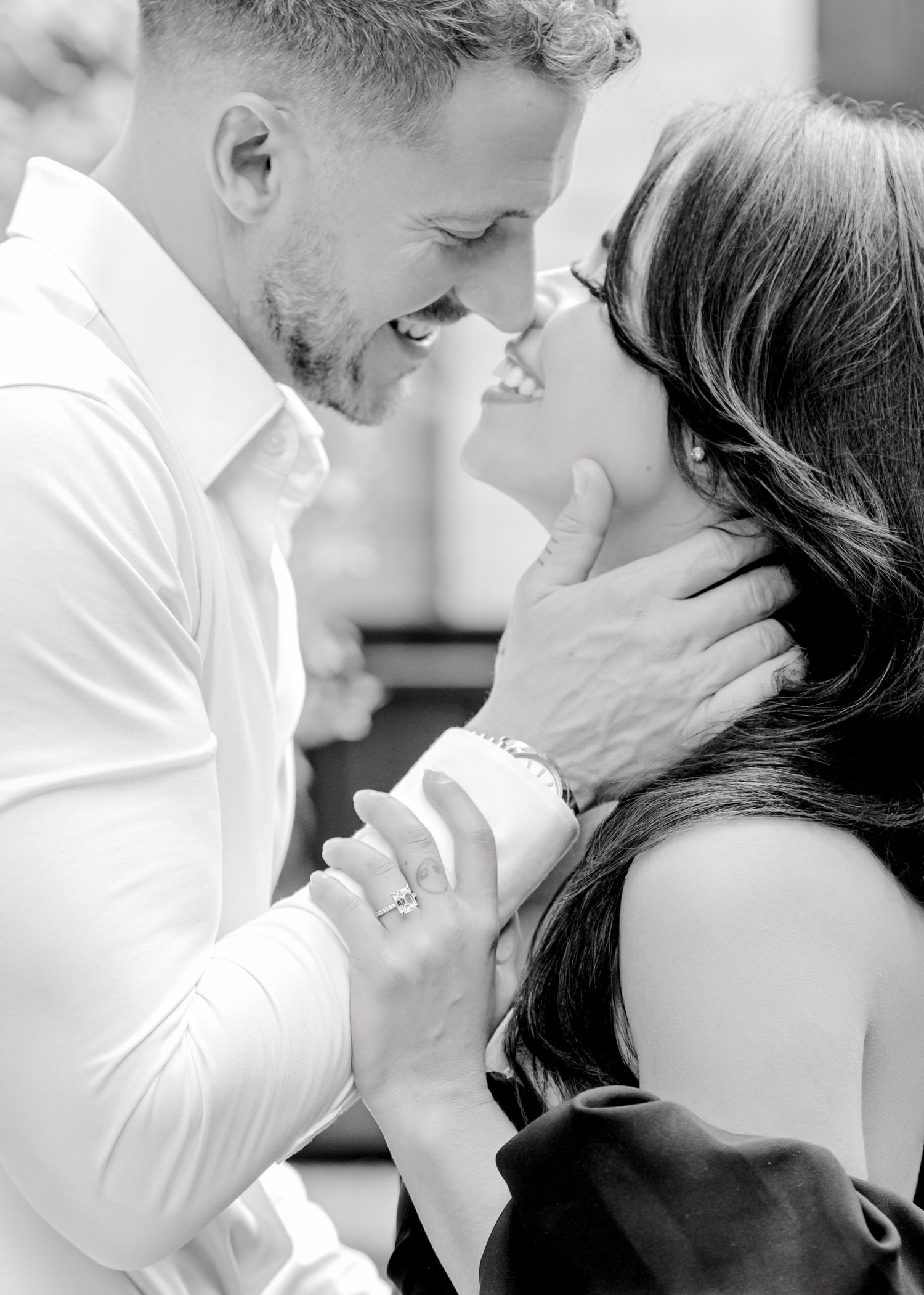 Intimate black and white close-up portrait showing tender emotional connection.