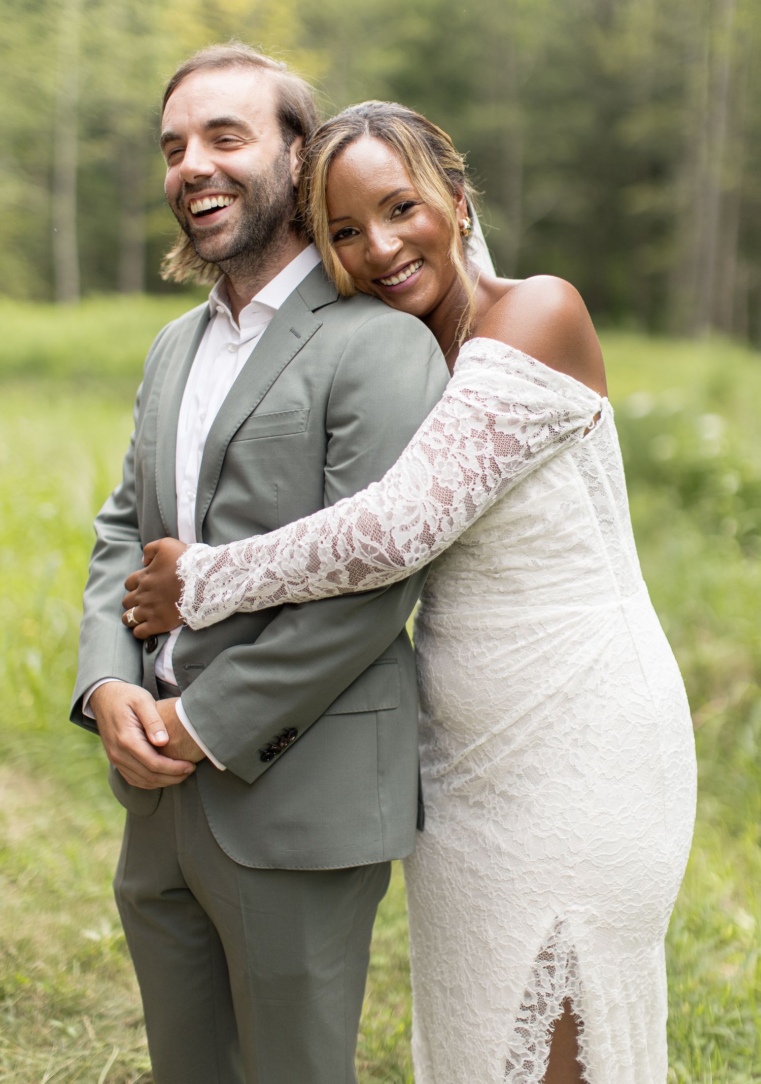 A couple in wedding attire share joyful embraces in a series of candid outdoor photos with a forest backdrop.