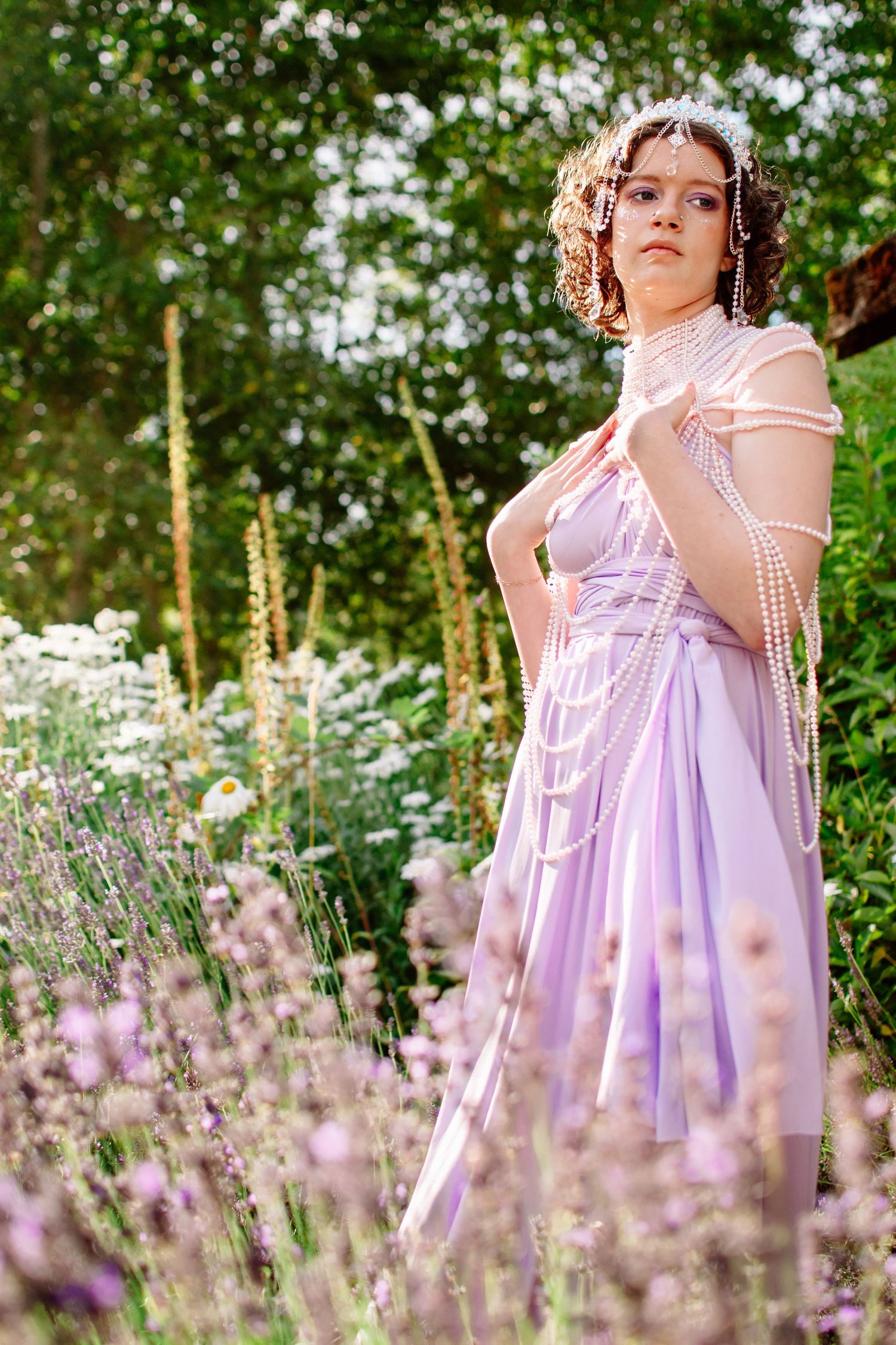 Elegant styled portrait with lavender gown and pearl details at The Pole Garden.