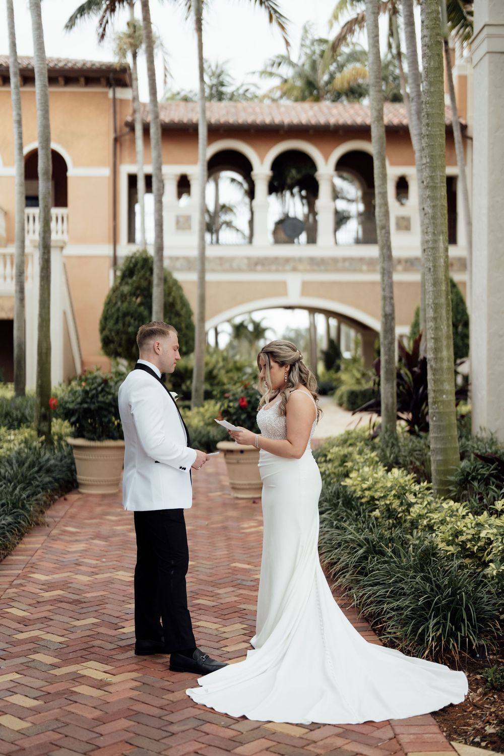 A sequence of wedding photos shows a couple on brick pavement surrounded by palm trees and Spanish architecture.