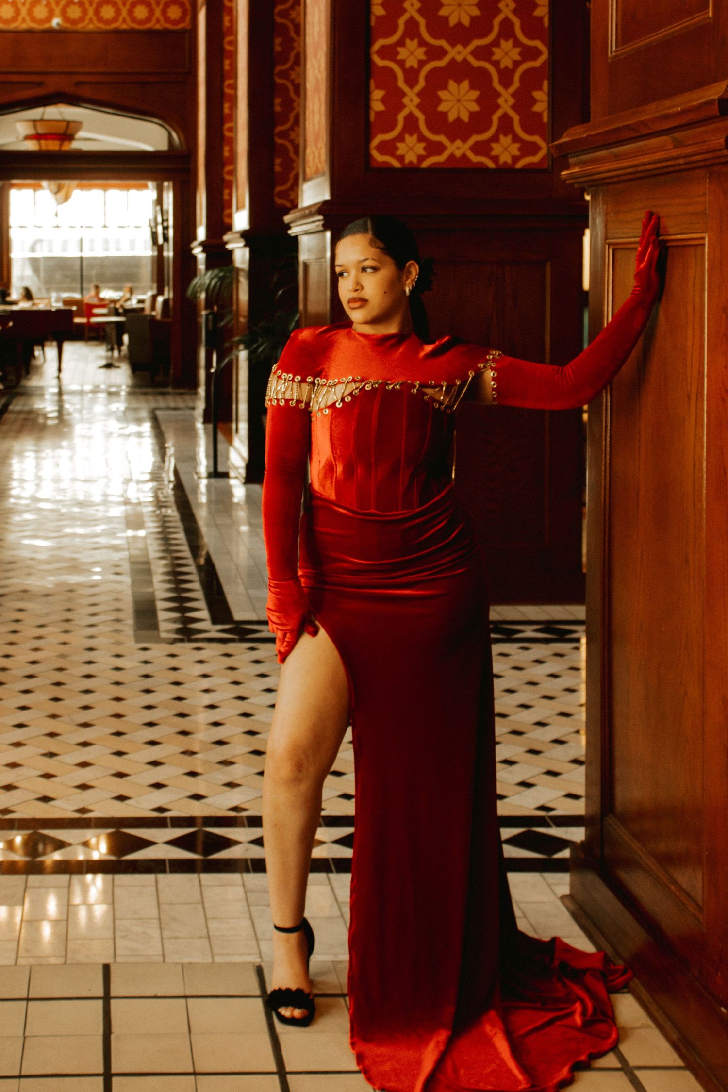 Woman in Red Dress Poses for Portrait Shot in Skirvin Hilton's Hotel Lobby