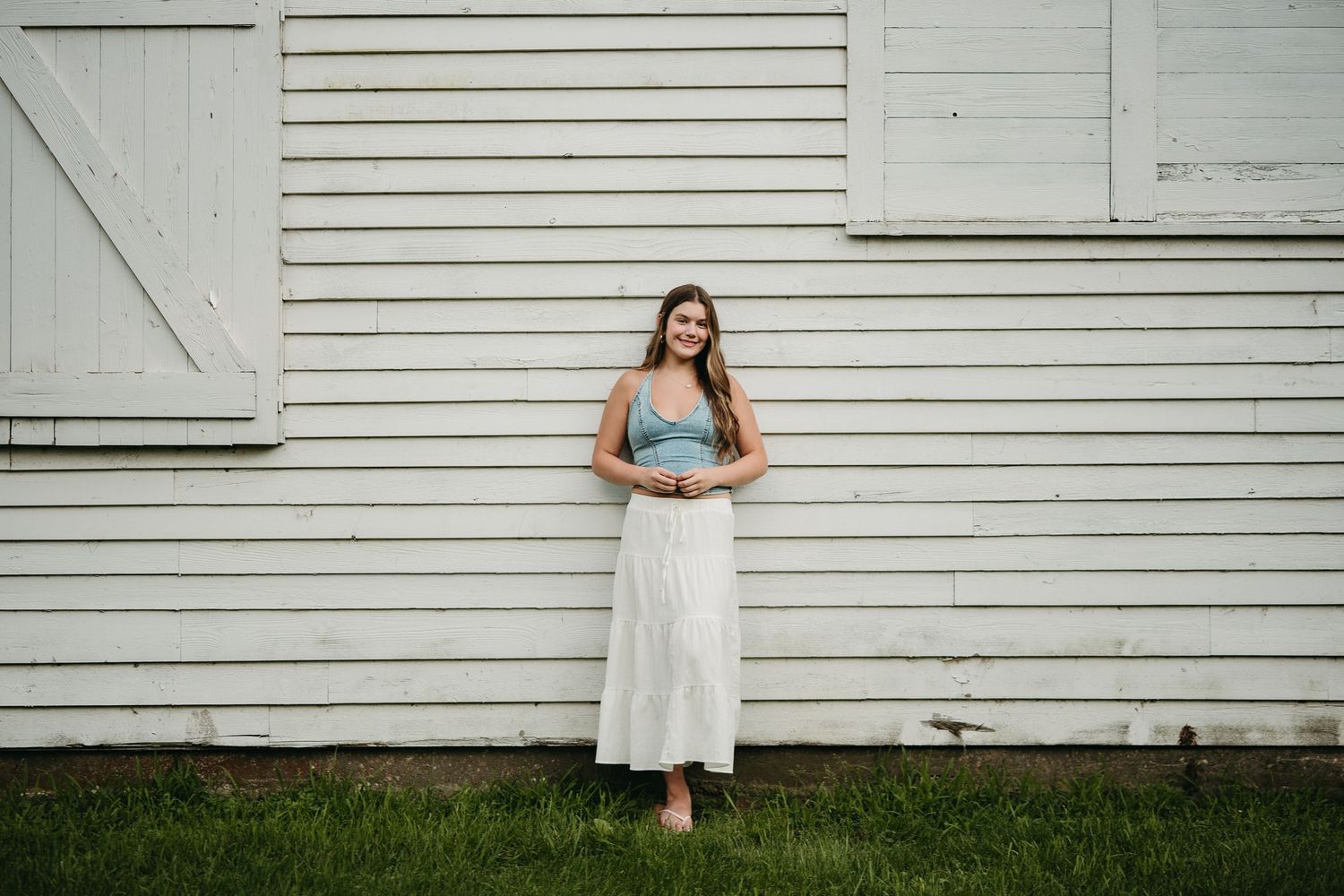 A collection photographs captured in warm tones showing a vintage-style lace dress and wavy brown hair.