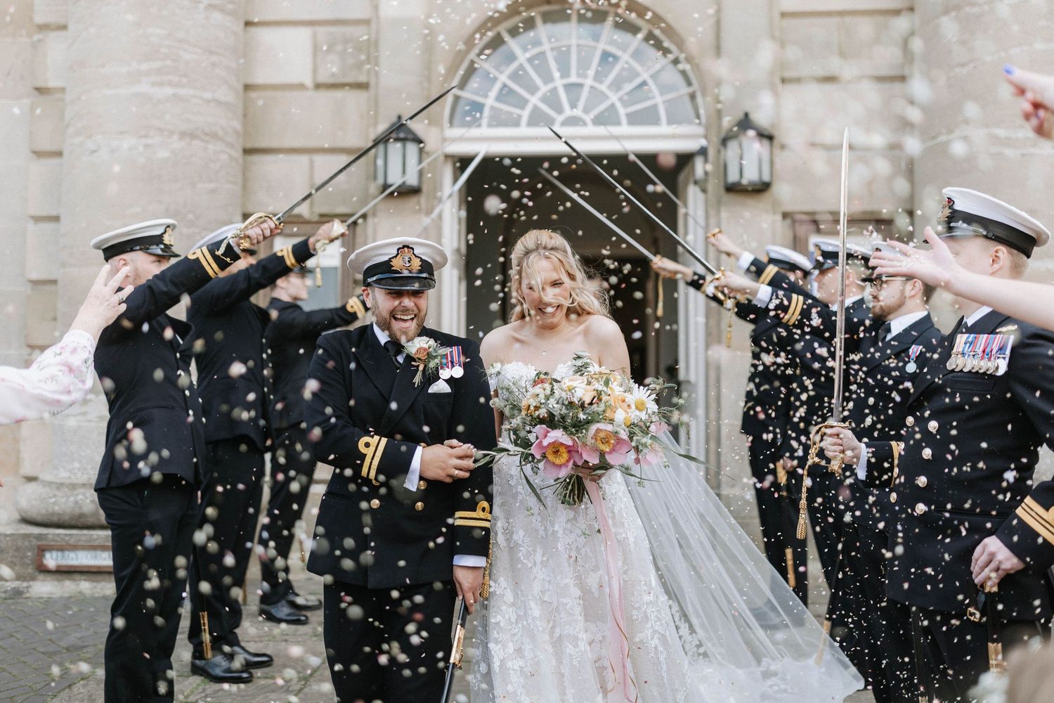 Traditional church wedding ceremony with couple at altar surrounded by wooden pews and stained glass windows.