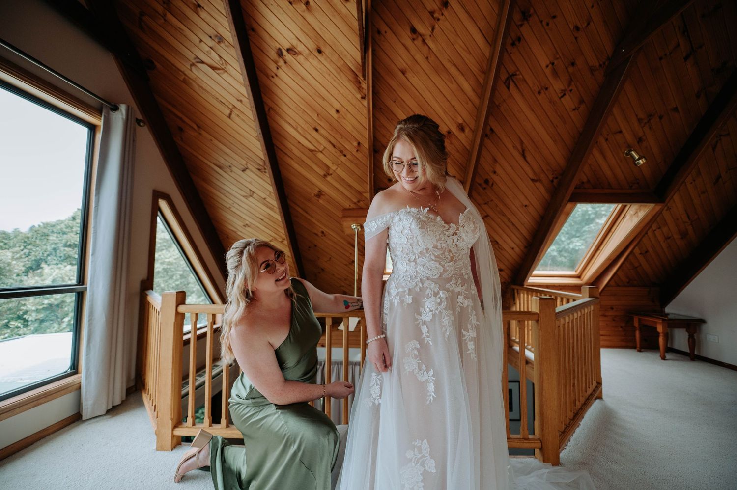 A bridal preparation scene in a sunlit attic with wooden beams and skylights.
