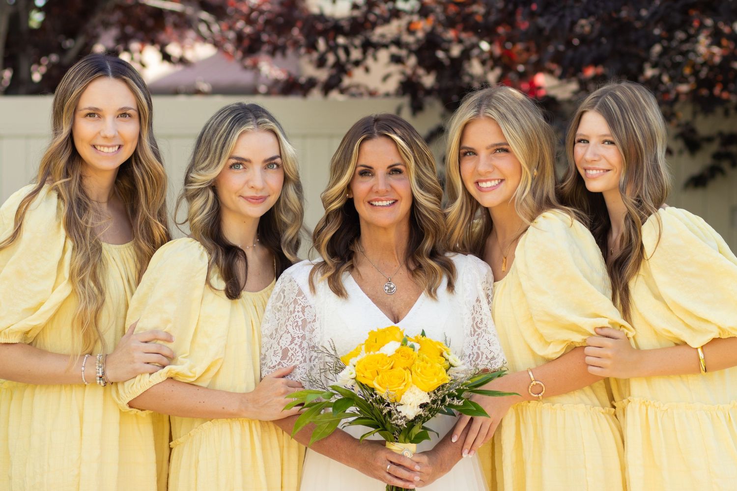 Bride and her bridesmaids in microwedding