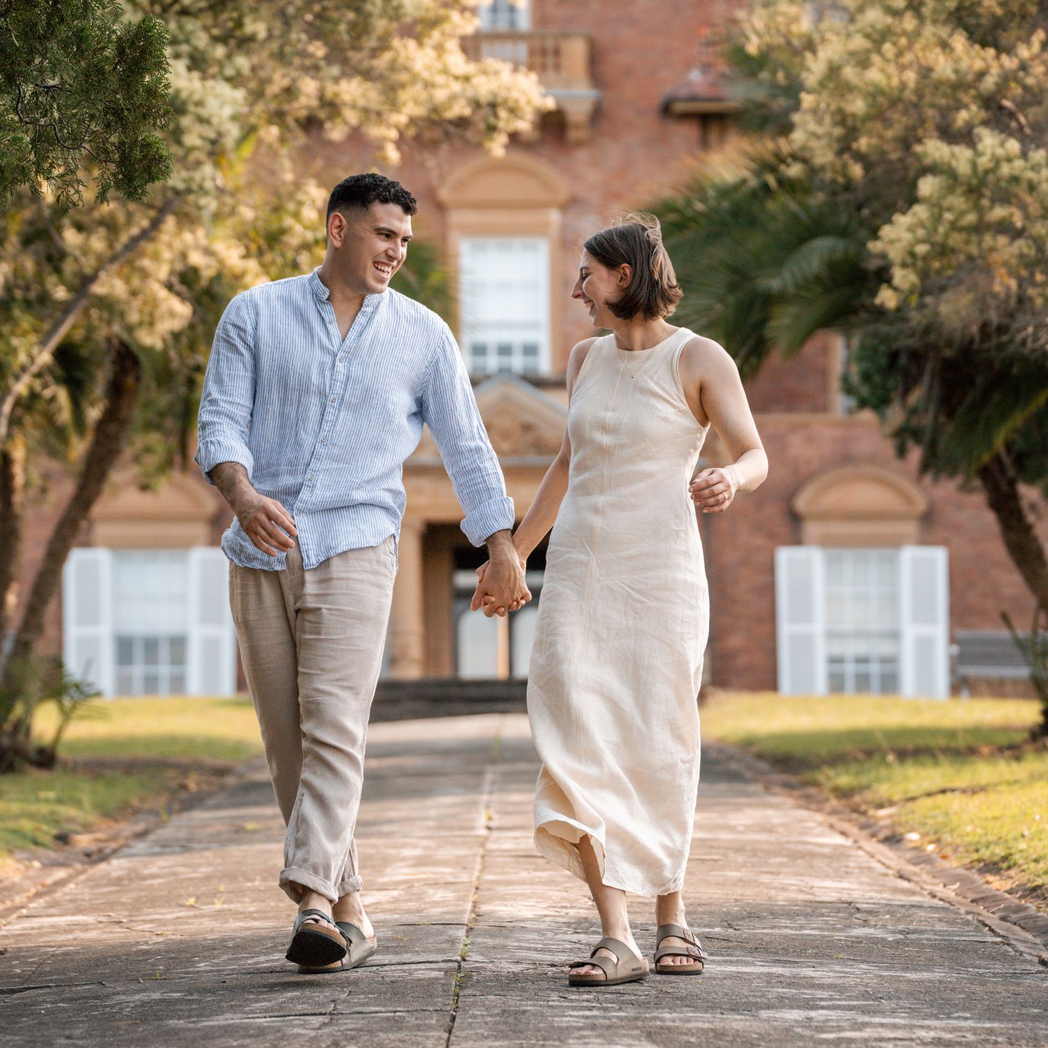 engagement-photoshoot-in-concord-couple-happily-walking-hand-in-hand