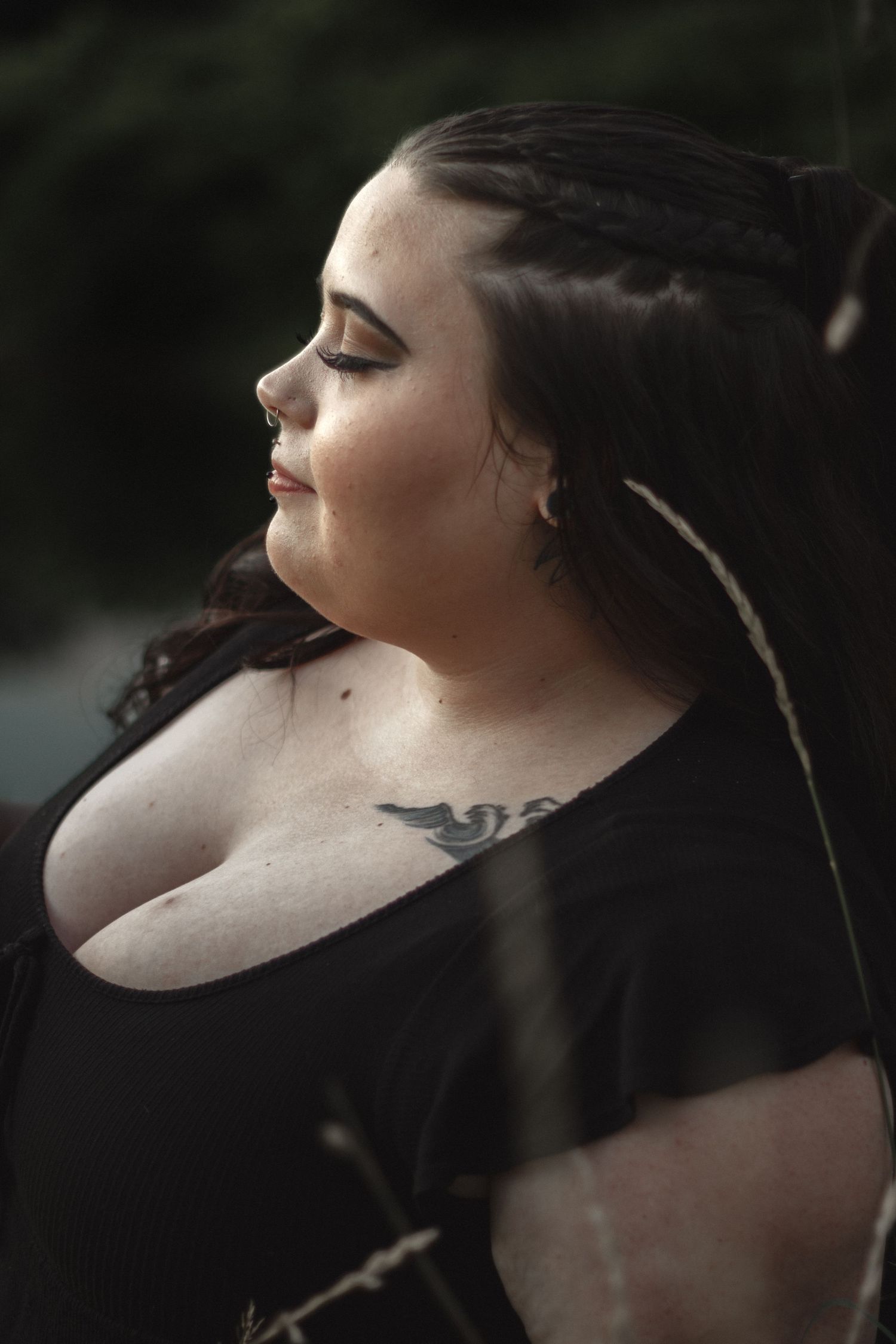 Side profile portraits showing serene expressions against a dark natural backdrop.