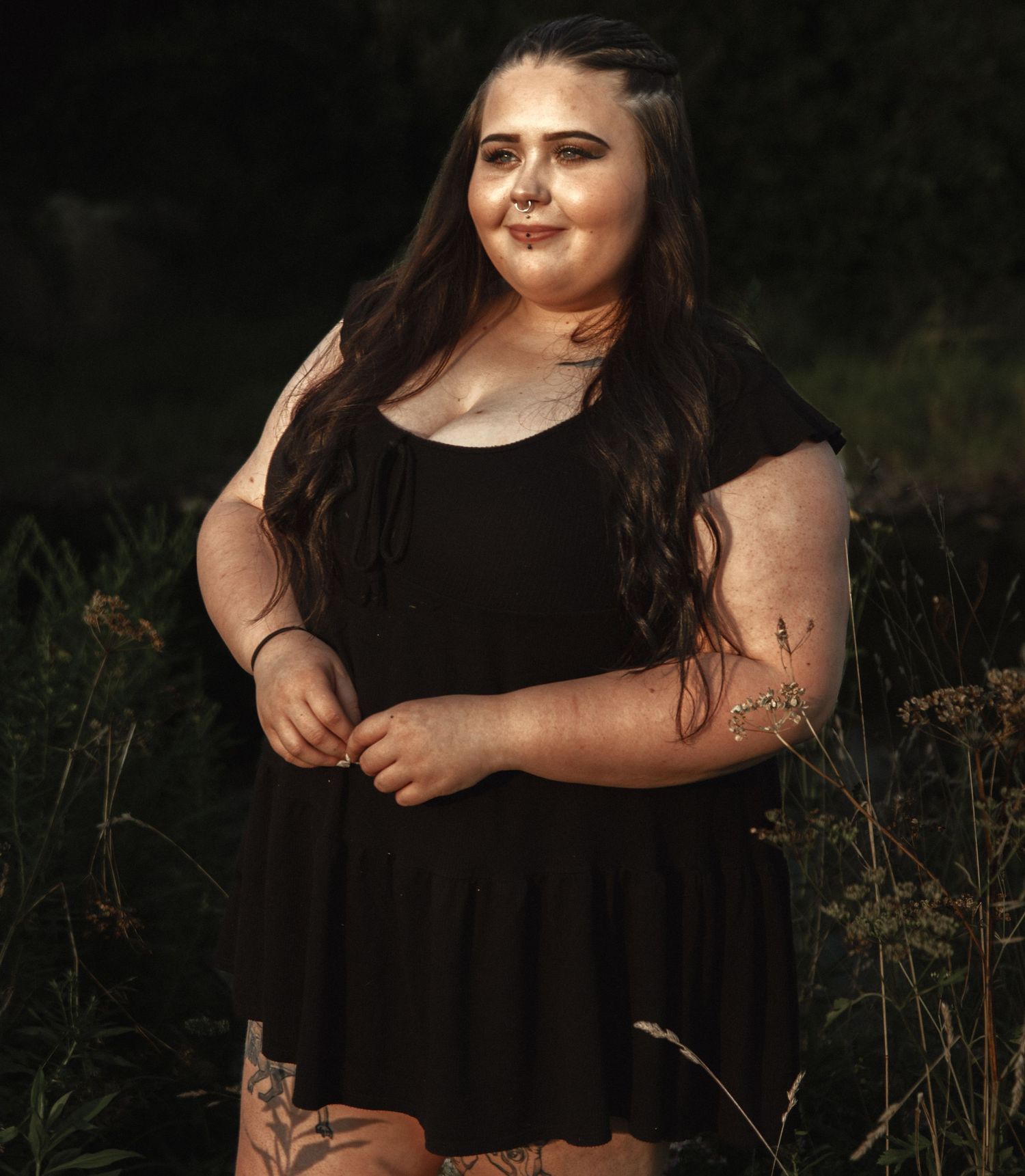 Natural light portrait series featuring someone in a flowing black dress outdoors.