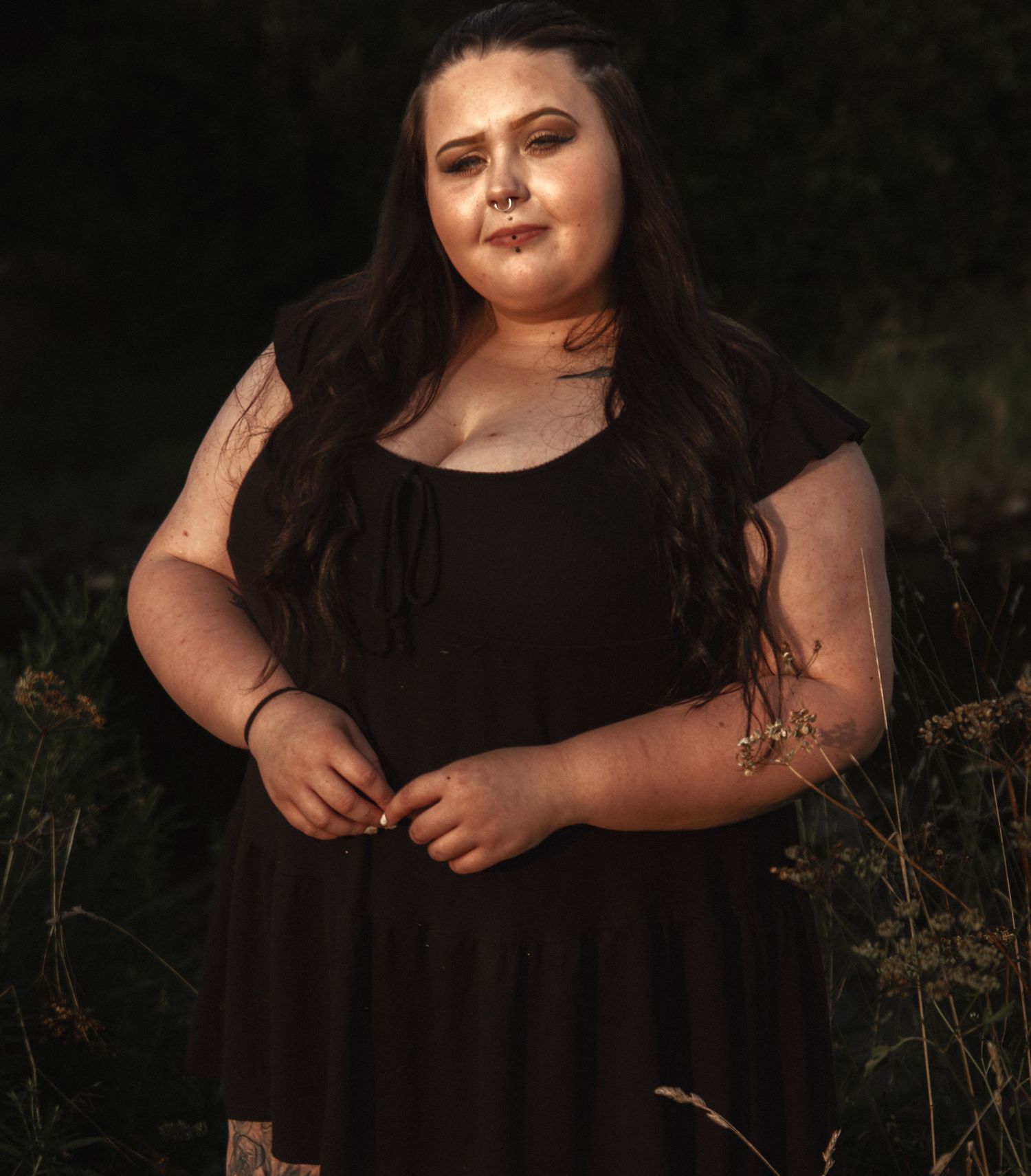 Candid outdoor portrait series with natural lighting and garden elements.