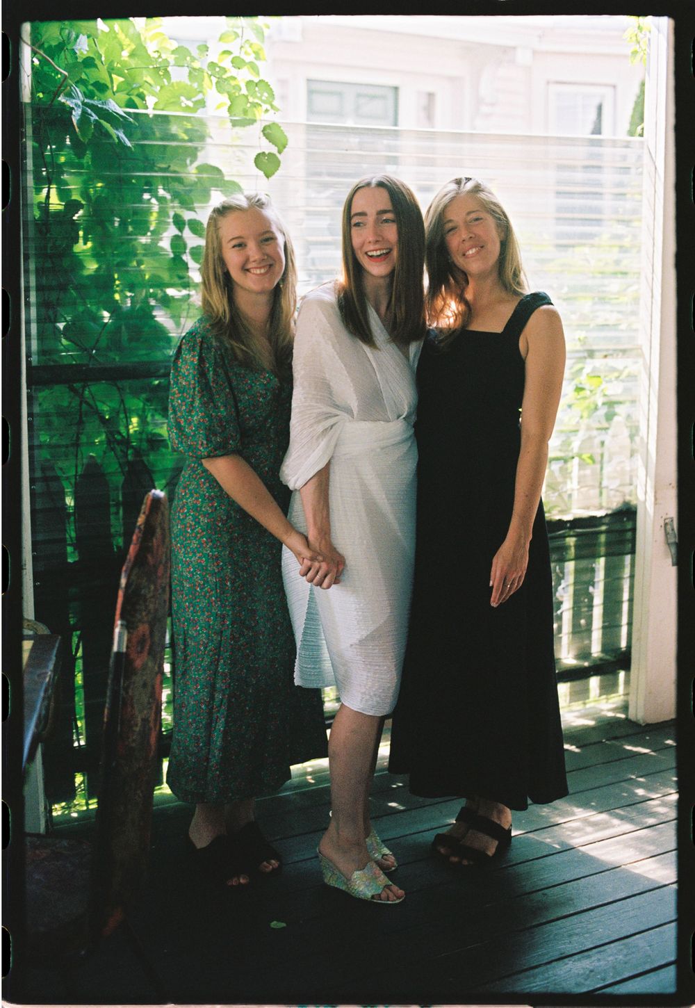 The bride to be and her friends pose together during a bridal shower at a wine bar in Brunswick, Maine.