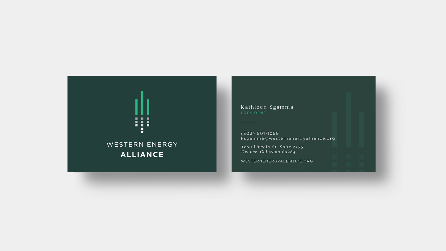 A mockup of modern black and orange business cards for Avanti Homes arranged at an angle on a white surface.