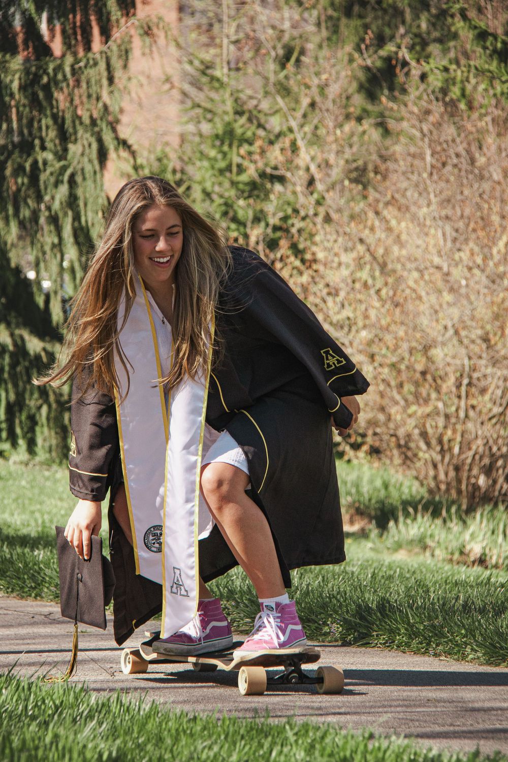Sequence showing someone skateboarding in a graduation gown and casual attire. Luxury wedding photographer North Carolina
