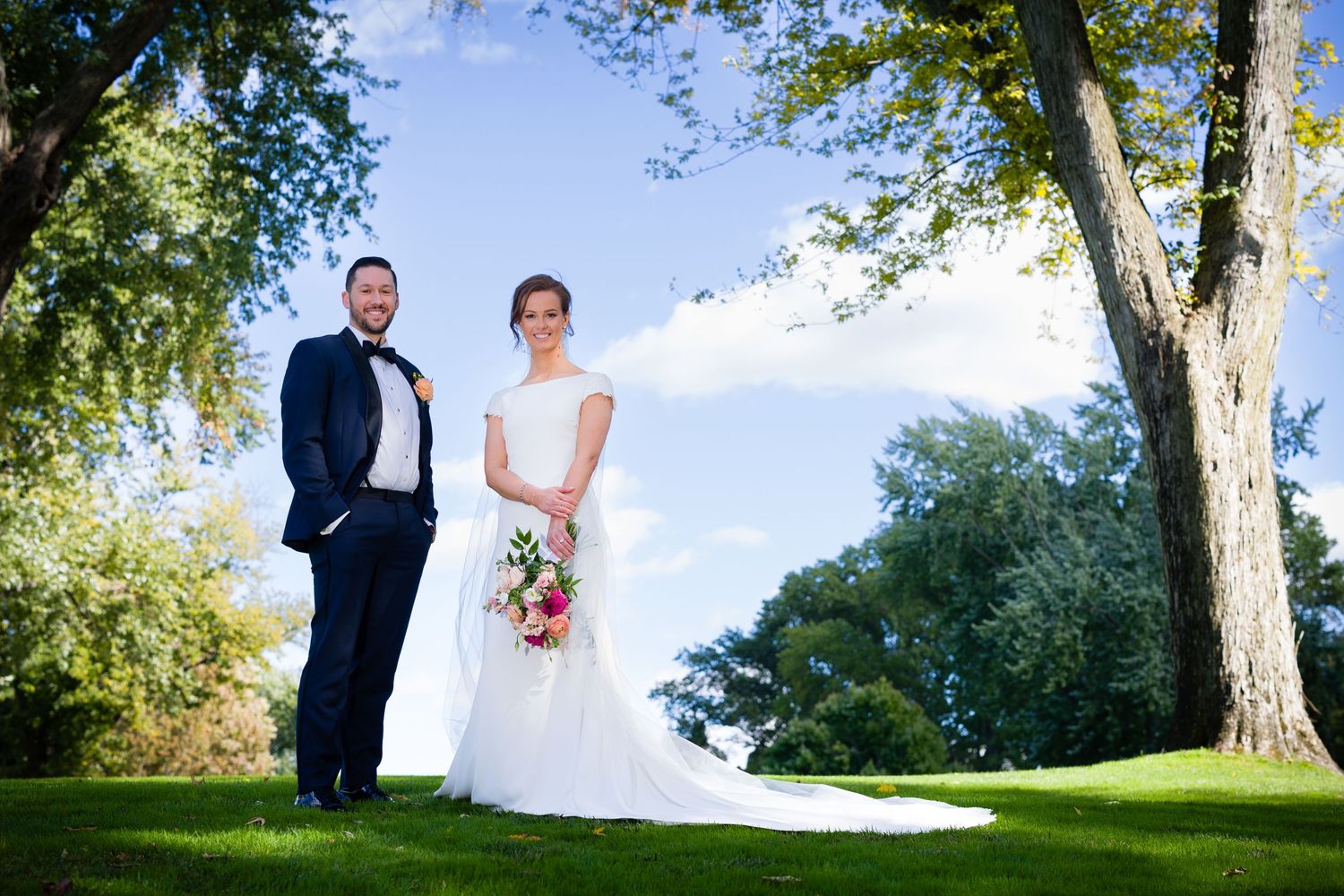 A perfect summer wedding outdoors at Woodlawn Golf Course.