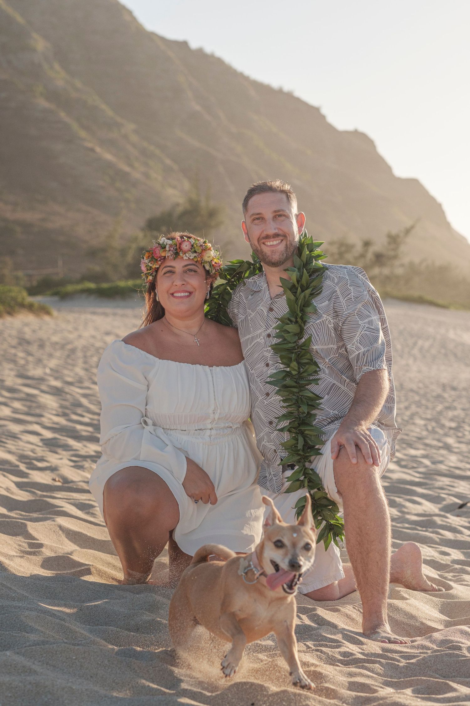 Couple sharing a romantic moment during a North Shore Oahu couples photography session at golden hour.