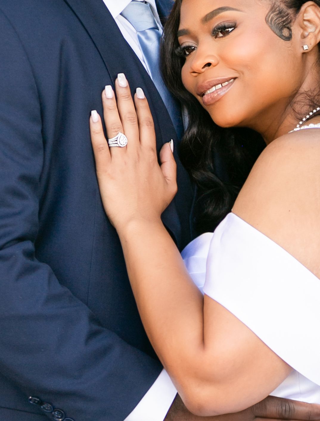 A romantic couple embraces in an intimate moment wearing formal attire, Orlando Courthouse Wedding Photographer, Sanford Wedding Photography