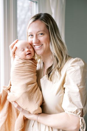 A series of four intimate portrait photos showing tender moments between parent and child in soft beige tones.
