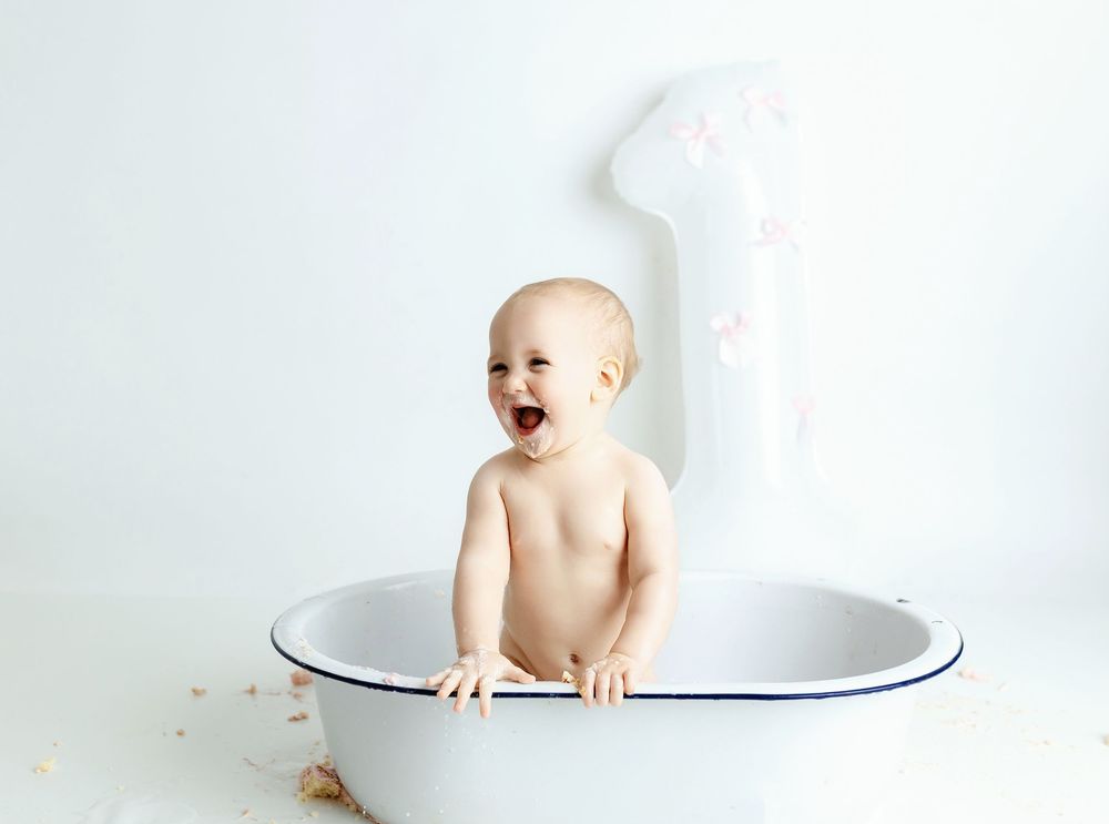 A tub splash. Greenville, SC newborn photographer, Easley, SC newborn photographer, Upstate SC newborn photographer