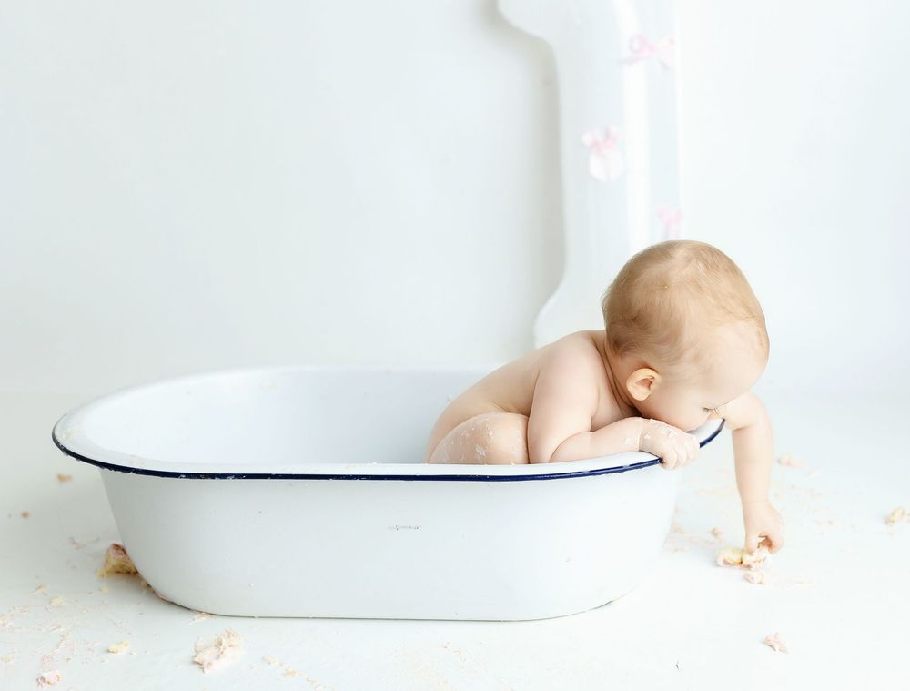 A little girl eating cake. Greenville, SC newborn photographer, Easley, SC newborn photographer, Upstate SC newborn photographer