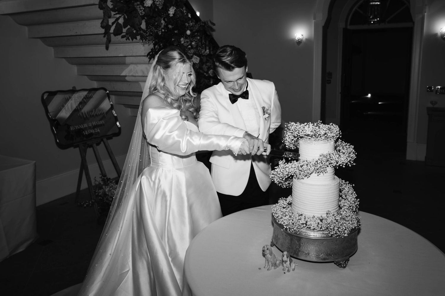 Cotswolds Wedding Photographer Bristol Zara Davis Photography Old Down Estate Gloucestershire couple cutting the cake