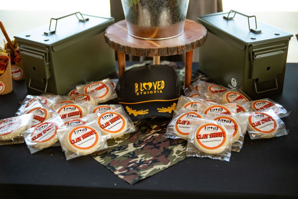 Packaged snacks and refreshments arranged on a table display.