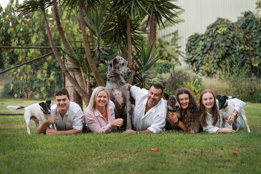 Family photoshoot with dogs at a beautiful rural setting in NSW taken by a professional dog friendly family photographer