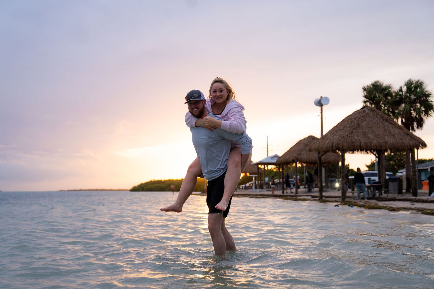 Couple photographed outdoors by Roam Media