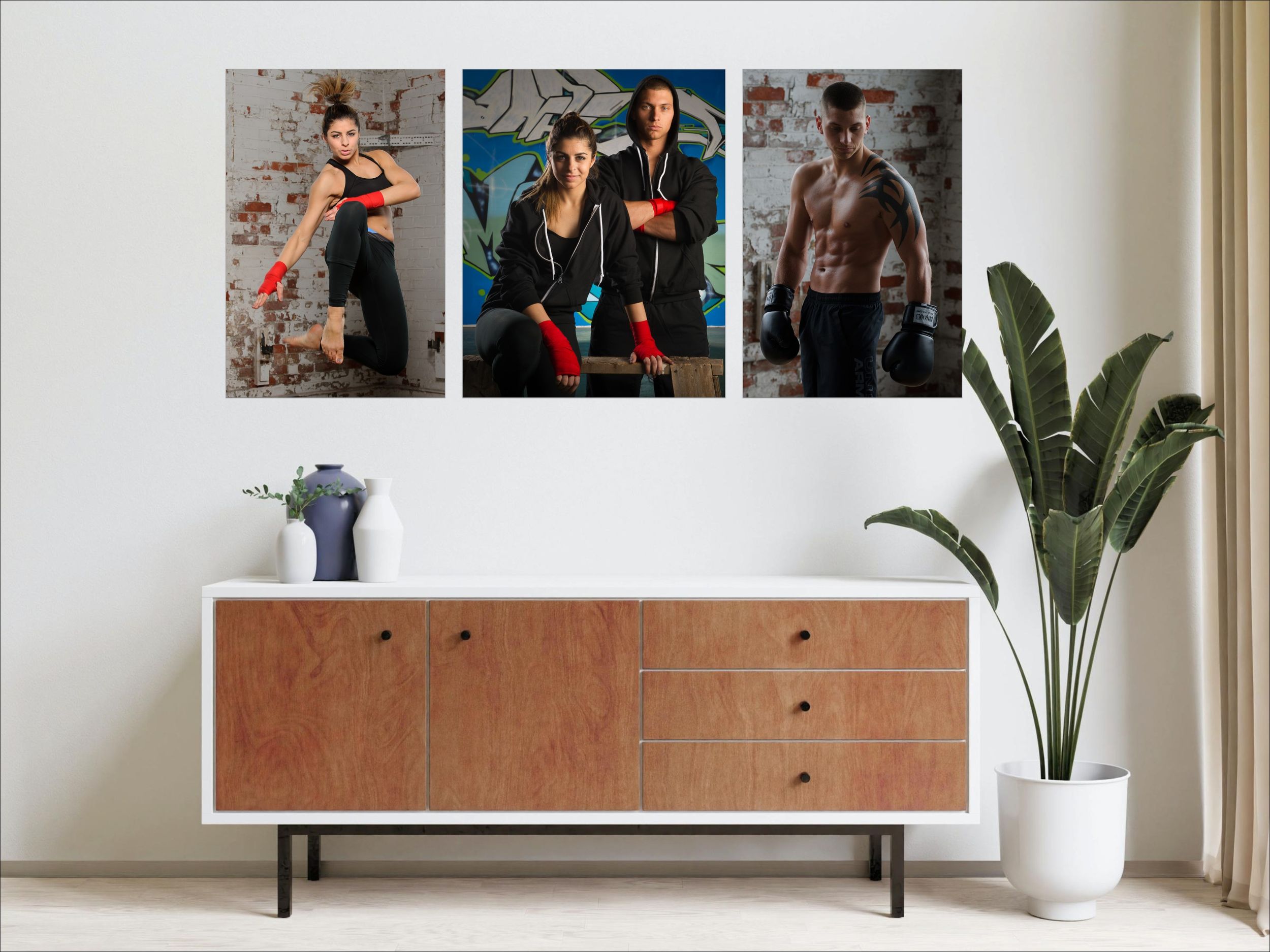 Wall art metal prints of a  Muay Thai portrait session hung above a contemporary buffet