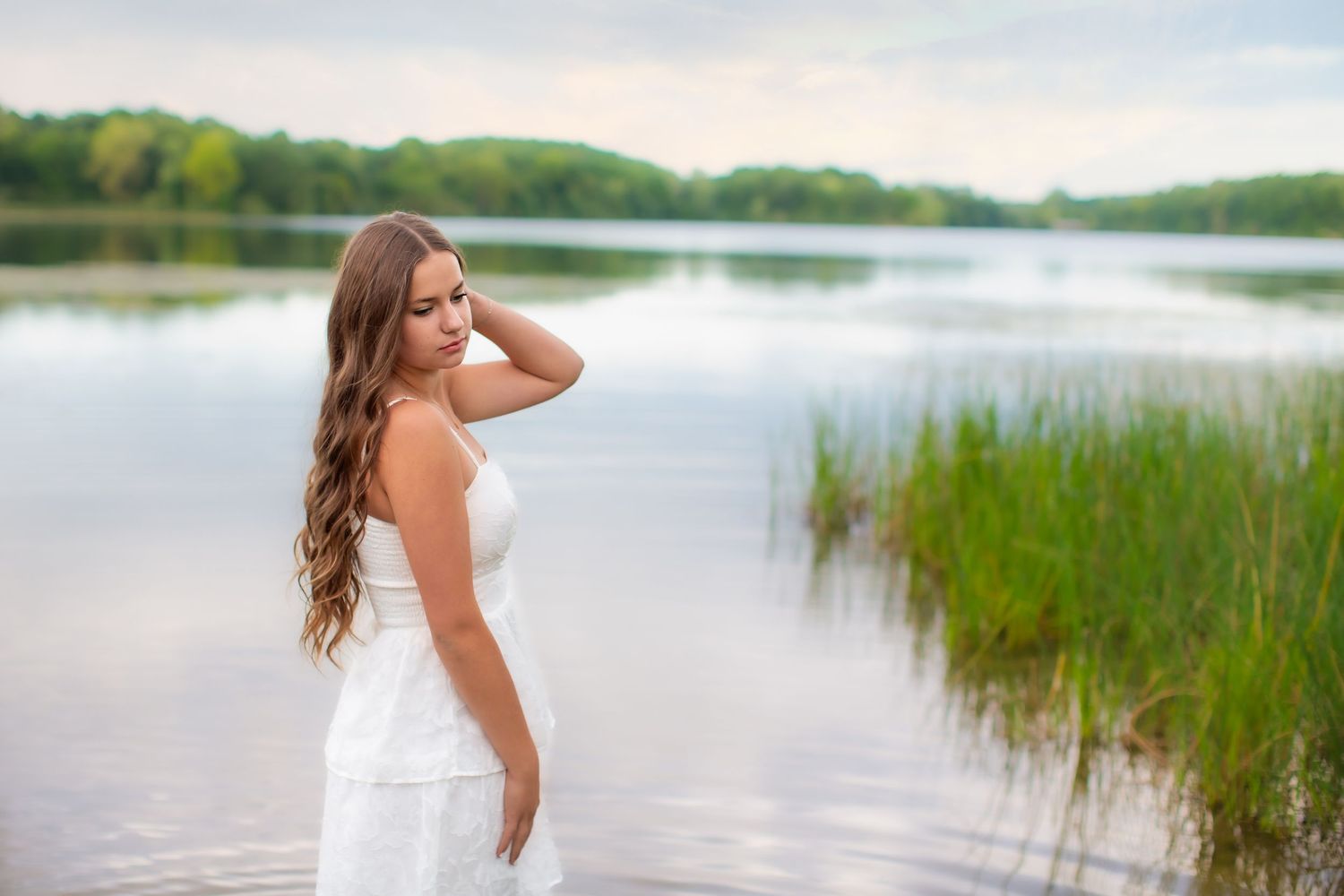 High school senior girl portrait photos at Island Lake state park and recreation area at sunset by South Lyon, MI photographer in Brighton