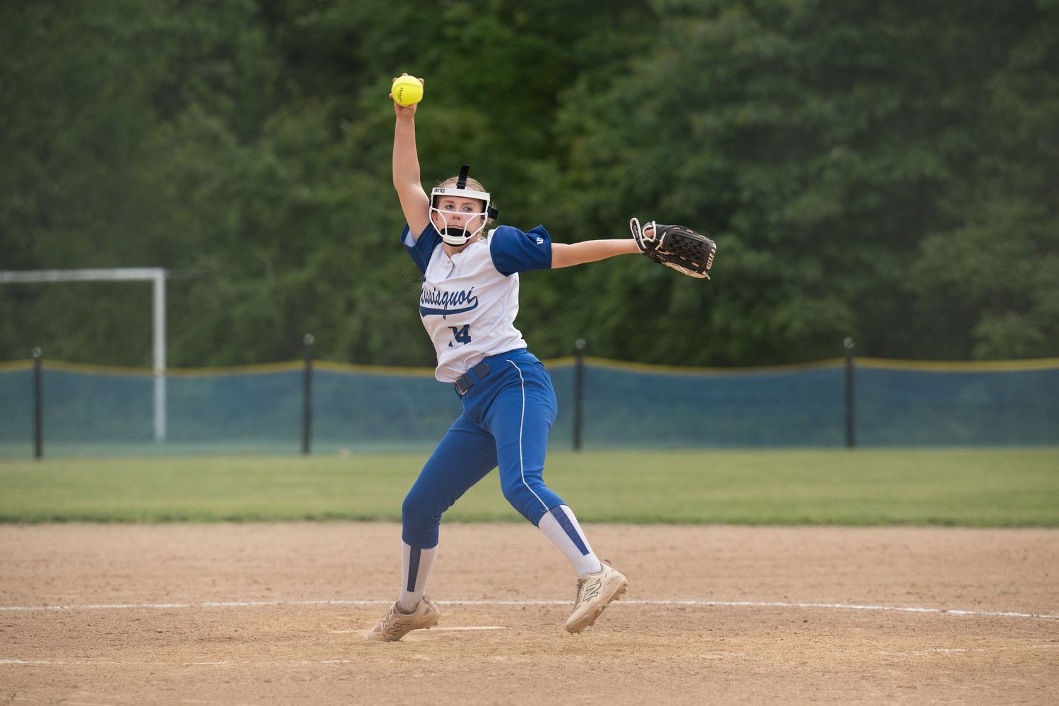Missisquoi Valley Union High School athlete delivers a pitch during a Vermont softball game.