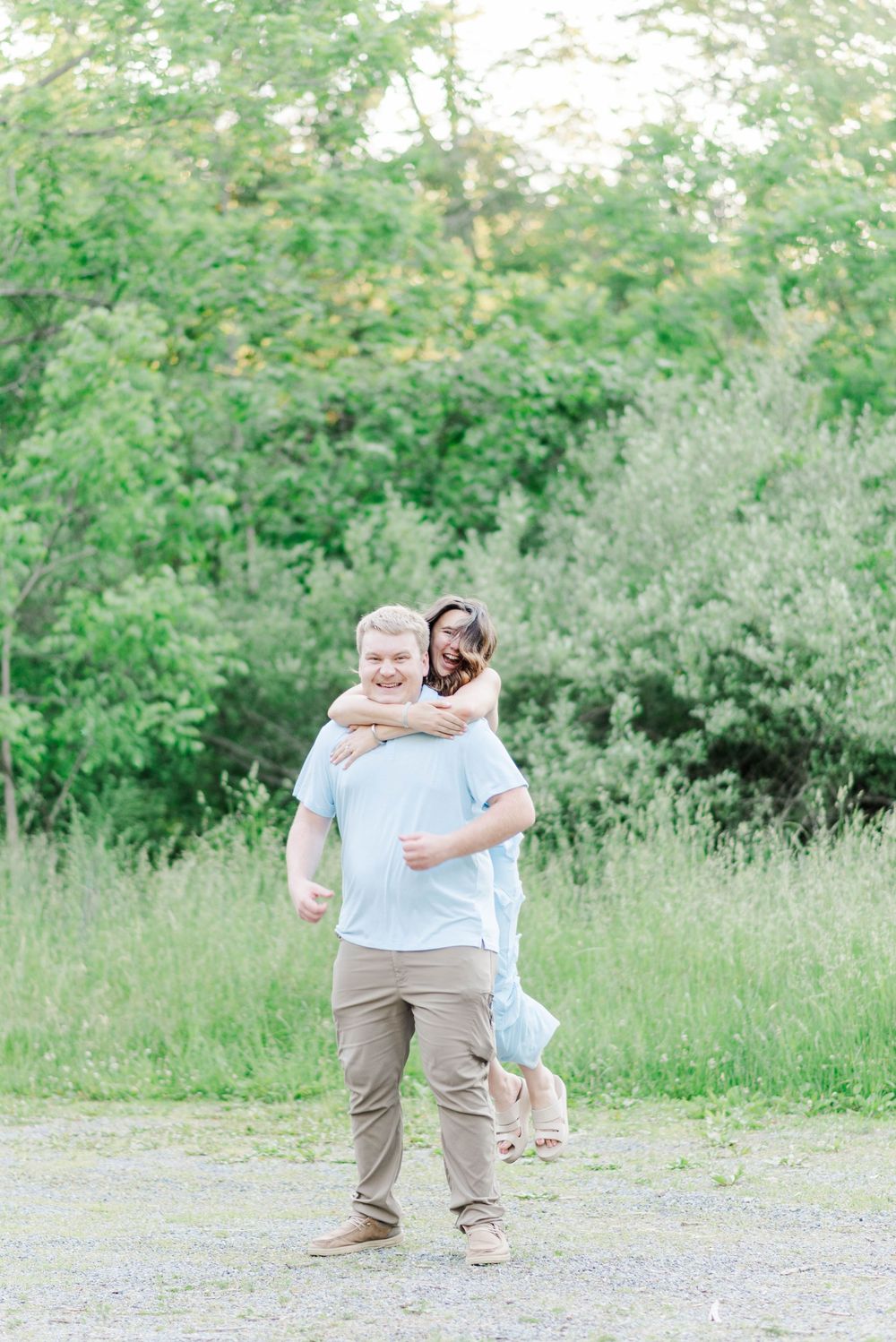 Engagement session at Quemahoning Reservoir in Johnstown Pennsylvania, fun surprise jumping pose