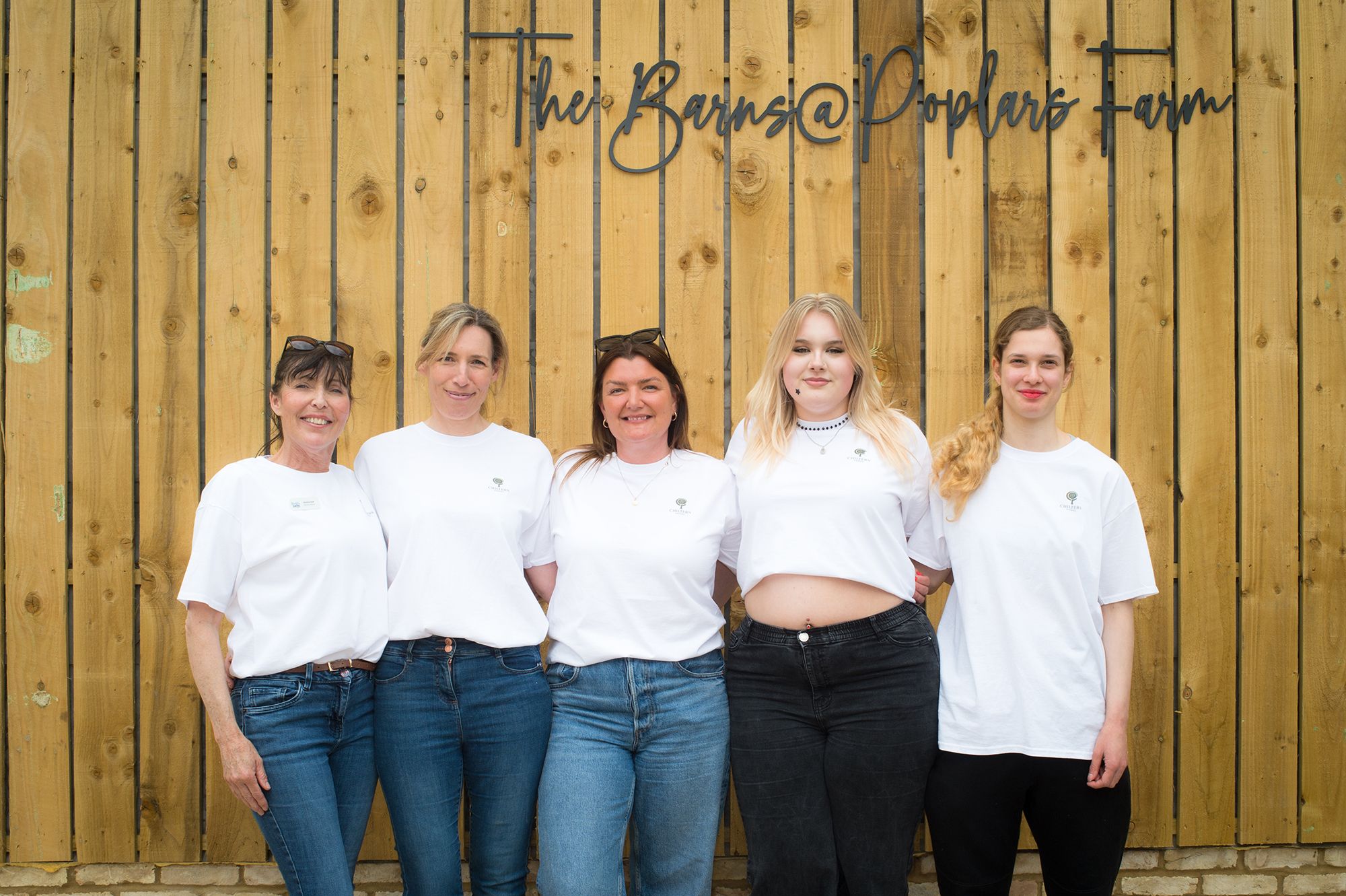 The team celebrating at the Chiltern Padel launch party, photographed by Abigail's studio in Buckinghamshire.