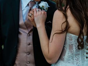 Close-up of emotional reactions during wedding ceremony vows.