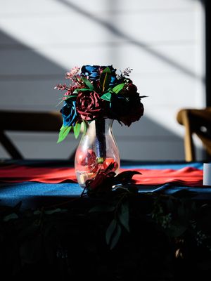 Artistic sequence of glass vase with flowers silhouetted against sunlit window creating dramatic lighting and shadows.