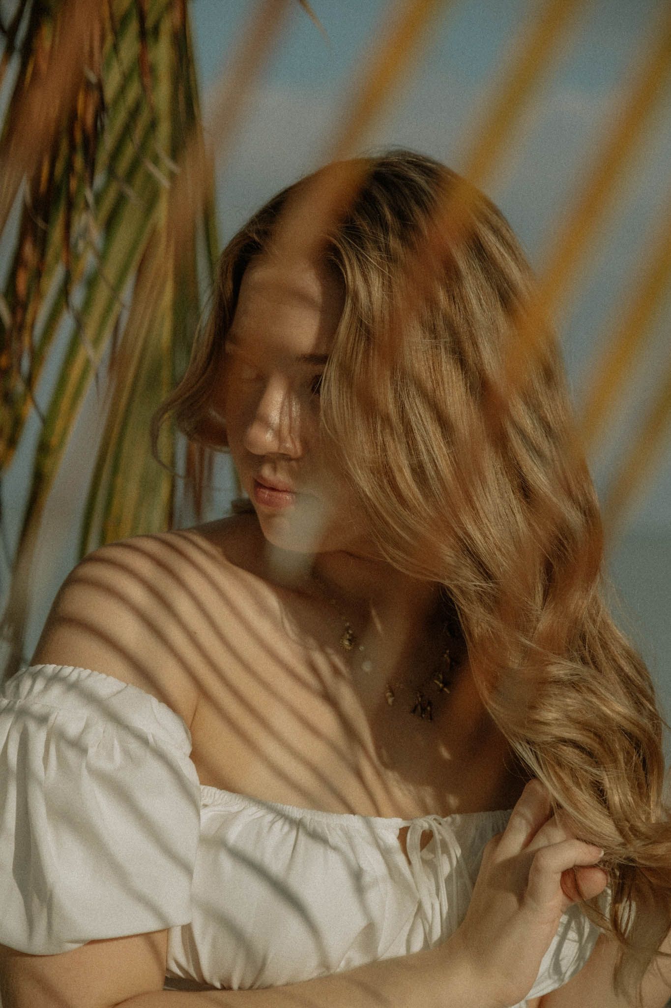 Dreamy portrait with soft lighting at the beach.