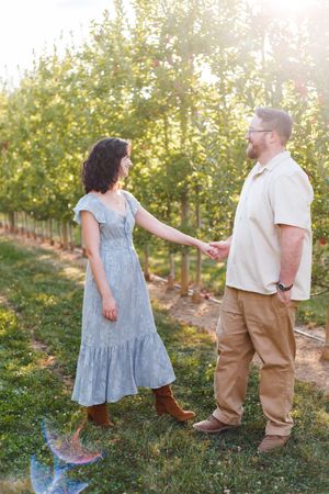 Sweet family moments captured in sequence at an apple orchard during golden hour.