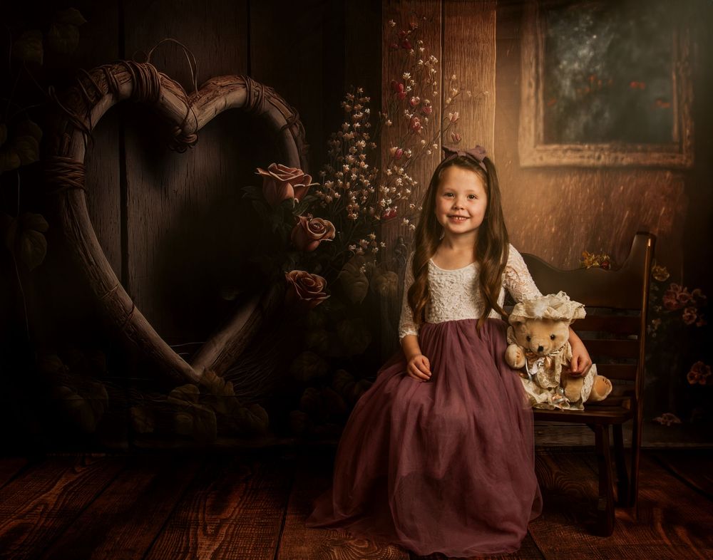 Eight moody dark studio portraits with burgundy dress and floral decorations in vintage style setting.