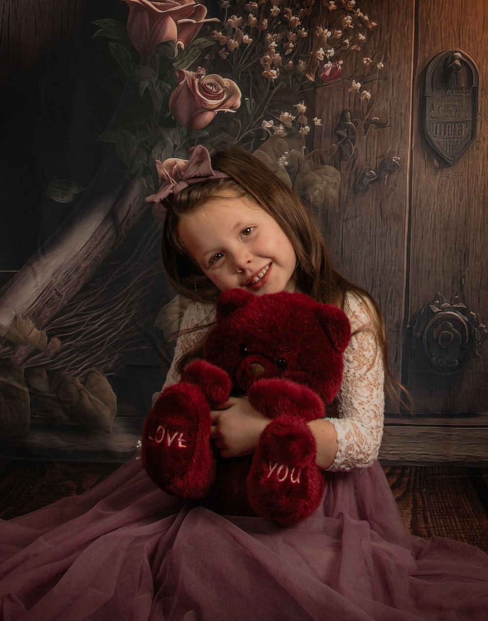 A series of romantic Valentine's themed portrait photos featuring a burgundy dress and red teddy bear against a wooden backdrop.