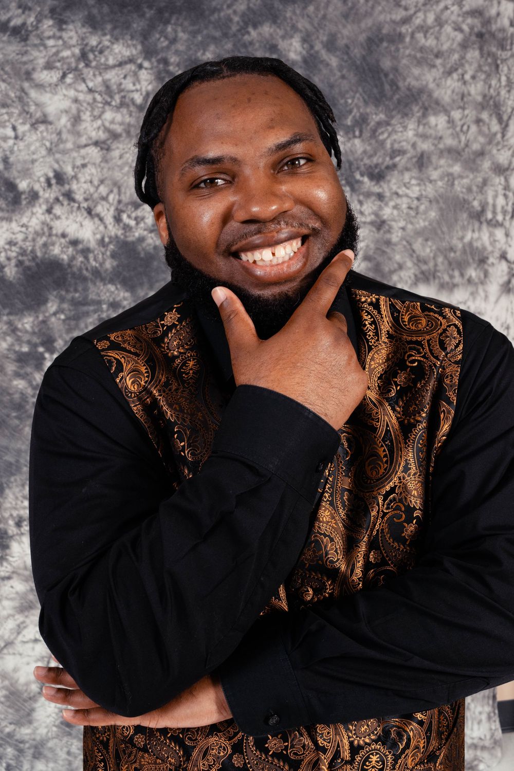 Professional portrait series showing joyful expressions and elegant black and gold patterned attire against a textured gray backdrop.